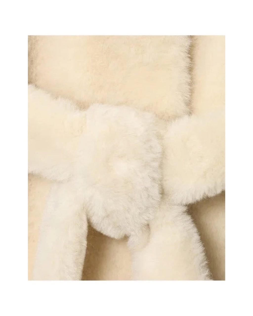 Manteau court en fausse fourrure Col claudine