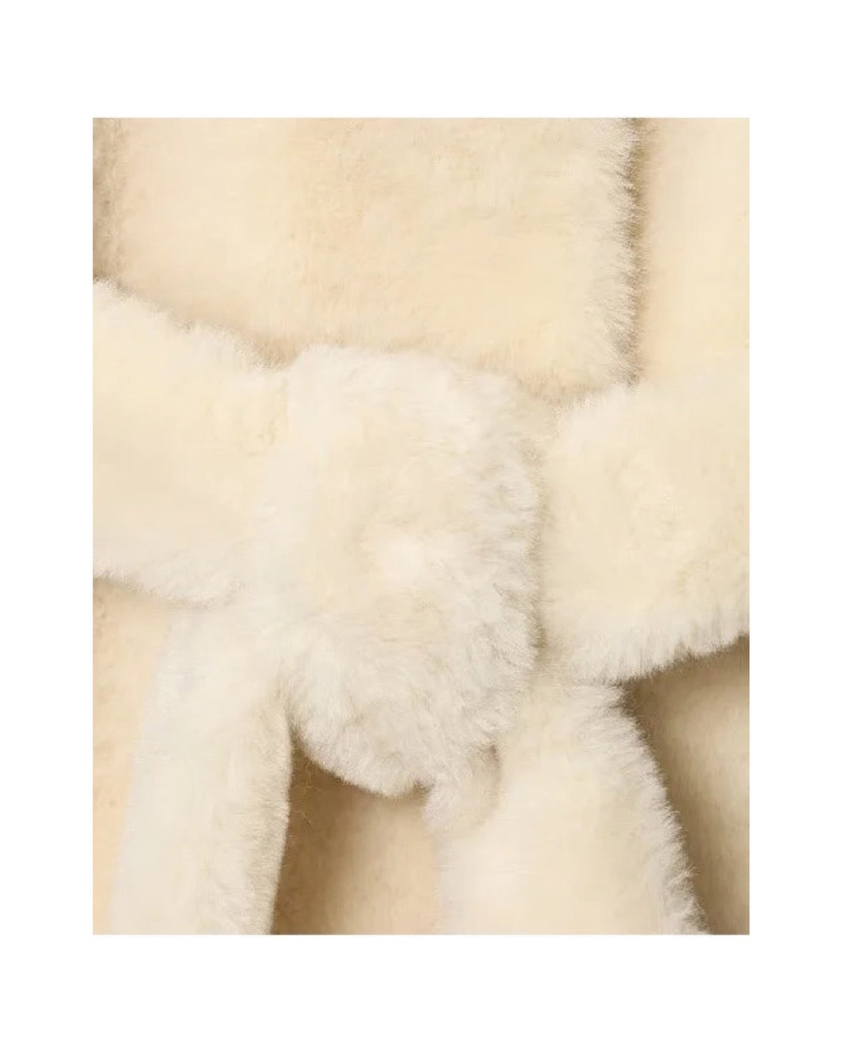 Manteau court en fausse fourrure Col claudine