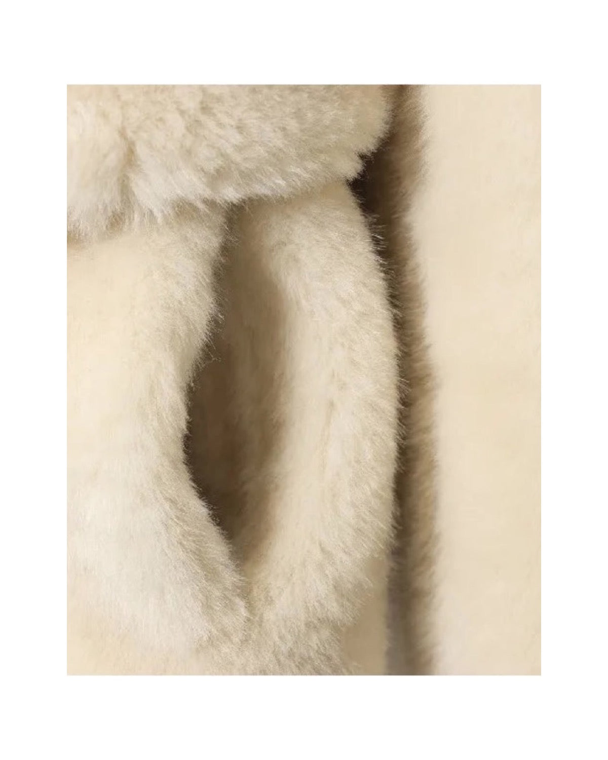 Manteau court en fausse fourrure Col claudine