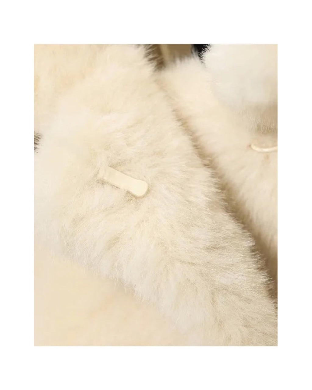 Manteau court en fausse fourrure Col claudine