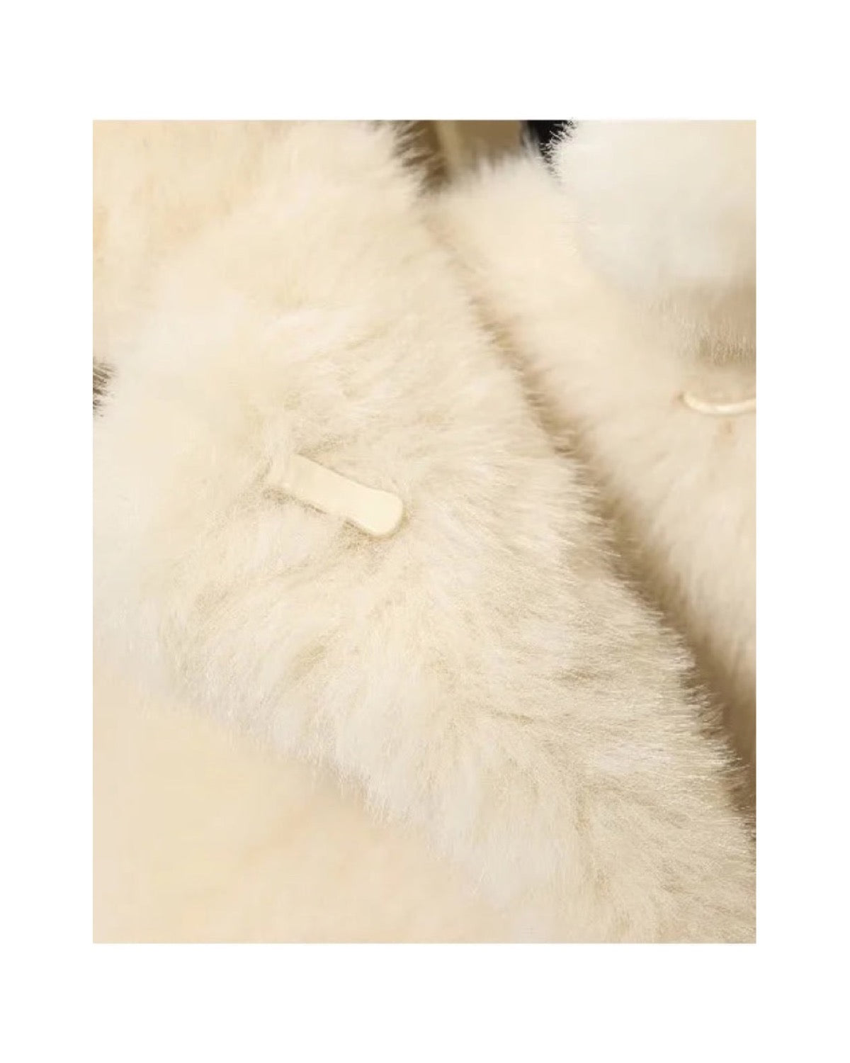 Manteau court en fausse fourrure Col claudine